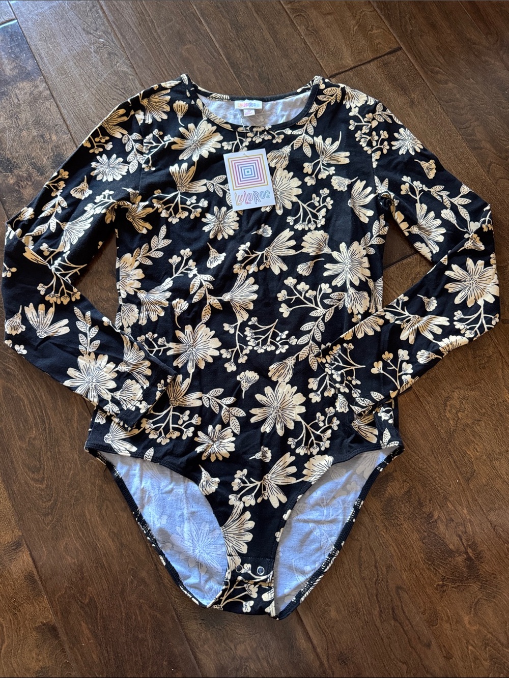 LuLaRoe Black Floral Long Sleeve Nova Bodysuit with Cream Flowers